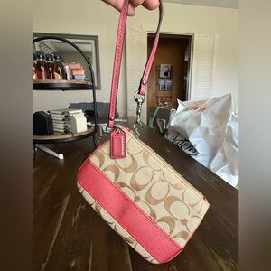 Coach Coral and Tan Wristlet with Signature Monogram